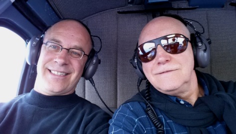 Selfie of Grant and Bill on board helicopter